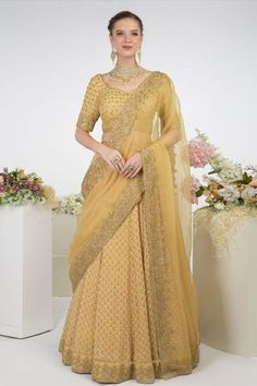 Gold lehenga highlighted with chikankari and zardozi hand embroidery. Comes with sweetheart front neckline blouse and silk organza dupatta.
Components:3
Embroidered
Neckline: Sweetheart
Sleeve Length:Half
Fabric:Blouse and Lehenga: Georgette; Dupatta: Silk Organza
Color:Gold
Embroidered blouse and dupatta
U-shaped back - Aza Fashions Gold Lehenga, Lehenga Blouse Designs, Georgette Dupatta, Lehenga Wedding, Gold Outfit, Lehenga Skirt, Gold Blouse, Blouse For Women, Organza Dupatta