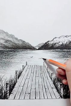 someone is drawing a dock on the water