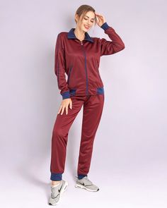 This women's 2-piece tracksuit features a comfortable track material suitable for any age and all sorts of casual and sports activities. Tracksuits have always been in mainstream fashion trends and the elegant color combinations has made this 2-piece tracksuit a top choice for every day activewear. Many traditional outlets do carry trimmed jogger track pants with full zip up track jackets but not many carry a matching 2-piece jogging outfit. This matching 2-piece jogging outfit is available in regular sizes from XS to XL and also plus size are available as 2XL and 3XL. Rest assured that these jogging suits run true to size and offer a relaxed and comfortable fitting for all ages. Specifications: Jogger style track pants Full zip up track jacket with 2 zippered side pockets Matching 2-piece Tracksuit With Pockets For Jogging, Sportswear Tracksuit With Pockets For Jogging, Leisure Tracksuit With Pockets, Stretch Tracksuit With Pockets For Sports, Stretch Sports Tracksuit With Pockets, Fitted Tracksuit For Leisure In Sportswear Style, Fitted Tracksuit For Leisure Sportswear, Sporty Leisure Tracksuit, Fall Sports Tracksuit With Pockets