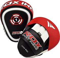 two red and black boxing gloves with the word rdx next to it on a white background