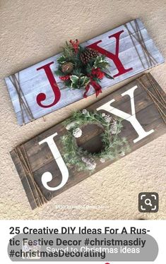 two wooden signs sitting on top of a floor next to each other with christmas decorations