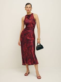 Sleeves are cancelled. Shop the Casette Silk Dress from Reformation, a sleeveless, midi dress with a cowl neck,  side ruching and an open back. Satin Dress Midi, Silk Dresses Outfit, Casual Silk Dresses, Sustainable Wedding Dress, Red Satin Dress, Burgundy Midi Dress, Bridesmaid Colors, Structured Dress, Reformation Dress