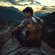 a man with tattoos sitting on top of a roof