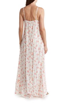 A high-low hem brimming with a ruffled finish creates easy movements in a dress covered in teeny flowers. Scoop neck Sleeveless 100% rayon Hand wash, dry flat Made in the USA of imported fabric Summer Floral Print High-low Hem Dress, Summer Floral Print Dress With High-low Hem, Flowy Ditsy Floral Maxi Dress, Summer Daywear Maxi Dress With Ruffle Hem, Summer Daywear Midi Dress With Ruffle Hem, Summer Maxi Dress With Ruffle Hem For Daywear, Flowy Maxi Dress For Spring Daywear, Summer Midi Dress With Ruffle Hem For Daywear, Cotton High-low Hem Summer Dress