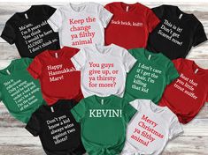 seven t - shirts with different sayings on them, all in red and green