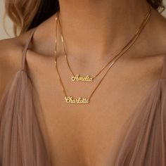 • Material: High-Quality Solid 925 Sterling Silver • Finish: Sterling Silver ∙ 18K Gold ∙ Rose Gold• Dimensions: Depending on your font choice, height sizes range from 3mm to 4mm lowercase SKU: MM-NM92F97 Classic Name Necklace Perfect As A Gift, Classic Name Necklace As A Gift, Elegant Letter-shaped Necklaces With Names, Classic Customized Name Necklace For Mother's Day, Customized Classic Name Necklace For Mother's Day, Classic Name Necklace As Personalized Gift, Classic Name Necklace For Personalized Gift, Classic Nameplate Necklace, Classic Everyday Jewelry With Names