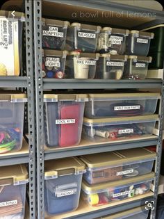 the shelves are full of plastic containers with labels on them and labeled to keep things organized