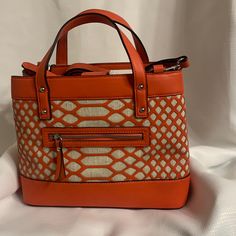 New Condition And Never Used. Coral And Straw Type Fabric Make It Perfect For Summer! Casual Orange Satchel With Double Handle, Casual Orange Shoulder Bag For Errands, Casual Orange Shoulder Bag, Casual Orange Satchel With Removable Pouch, Casual Tan Satchel With Double Handle, Casual Tan Satchel For Shopping, Summer Satchel With Zipper Closure For Shopping, Casual Orange Bags For Spring, Casual Orange Spring Bags