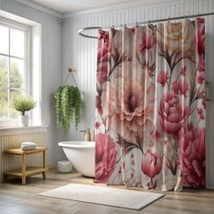 a bathroom with a tub, sink and shower curtain that has pink flowers on it