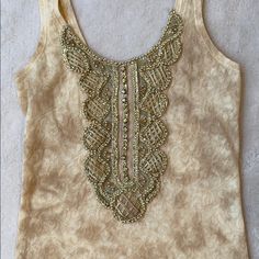 Nwot Never Worn! Don’t Have Anything To Wear It For So I’m Selling. Would Look Really Cute With A Black Mini Skirt. Reasonable Offers Accepted. Smoke Free Home With Hypoallergenic Pets. Gold Embellished Summer Top, Gold Embellished Tops For Summer, Beige Embellished Sleeveless Top, Sleeveless Embellished Beige Top, Fitted Embellished Beige Tops, Aesthetic Outfit, Black Mini Skirt, Black Mini, Summer Aesthetic