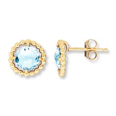 These stylish earrings for her feature round aquamarine centers encircled by beaded edge frames of 10K yellow gold. The earrings secure with friction backs. White Topaz Earrings, Beaded Edge, Gold Stock, Jewelry Education, Jewelry Advice, Stylish Earrings, Aquamarine Earrings, Twisted Wire, Stylish Earring