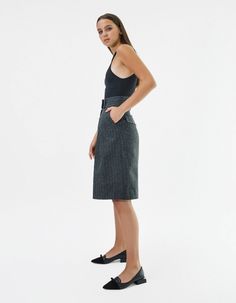 High-waisted knee-length shorts IPANTS.A wide waistband along with front pleats highlight the waist and make it visually thinner. Bermuda shorts are made from 100% striped wool in dark grey color and have an extra lining to be more pleasant to the body. Shorts have comfortable side pockets and faux pockets on the back. Belt loops, zip, and hook-and-eye closures on the middle.Composition: 100% woolLining: 100% viscoseCare: We recommend a professional dry clean. Do not wash. Do not bleach. Do not Chic Striped Knee-length Bottoms, Elegant Gray Short Length Bottoms, Gray Knee-length Workwear Bottoms, Gray Knee-length Bottoms For Workwear, Chic Gray Knee-length Bottoms, Fitted Striped Knee-length Bottoms, Body Shorts, Knee Length Shorts, Dark Grey Color