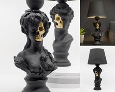 a black table lamp with gold skulls on it and a skull statue next to it