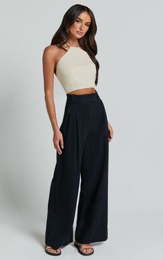 Get ready to turn heads in our Bette Pants - the ultimate statement piece for any fashion-forward babe. These high-waisted wide leg pants are designed to give you that effortlessly chic look, while keeping you comfortable all day long. Made from a luxurious cotton fabric, these relaxed pants will make you feel like a queen no matter where your adventures take you. Whether it's for a party or just another day slaying life, these full-length black pants are sure to become your new go-to. Embrace y Luxury High-waisted Pants For Day Out, Luxury Wide Leg Pants For Party, Luxury Full-length Wide Leg Pants, Luxury Black Party Pants, Luxury Wide Leg Full Length Pants, Luxury Stretch Full Length Pants, Luxury Full Length Wide Leg Pants, Luxury High Waist Black Wide Leg Pants, Luxury Stretch Wide Leg Pants For Party