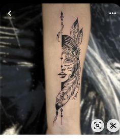 a woman's leg with a tattoo on it and an arrow in the center