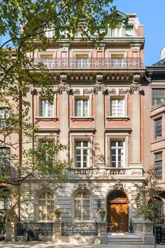 an old building with many windows and balconies