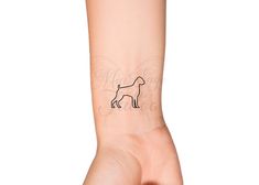 Boxer Dog Love Outline Temporary Tattoo - Puppy Love Tattoo - Pet Memorial Tattoo - Dog Breed Outline Family Love Wrist Tattoo Mia Sage Temporary Tattoos Size: The size of this Boxer Outline Temporary Tattoo is approximately 1 1/4 inches in length. If you would like this design in a smaller or larger size that isn't listed, please message me on Etsy and I would be more than happy to accommodate you. Directions: 1. Cut excess paper around tattoo with scissors to eliminate any unnecessary adhesive Boxer Dog Outline Tattoo, Boxer Dog Tattoo Ideas, Tattoo Pet, Love Wrist Tattoo