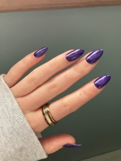 A hand with a ring on the index finger that has dark purple nails Dark Purple Round Nails, Deep Purple Almond Nails, Dark Purple Chrome Nails Almond, Dark Purple Nails For Prom, Nails For Dark Purple Dress, Rounded Summer Nails, Dark Purple Almond Acrylic Nails, Pretty Almond Nails Colour, Simple Dark Purple Nails