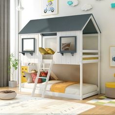 a child's bedroom with a bunk bed and stairs