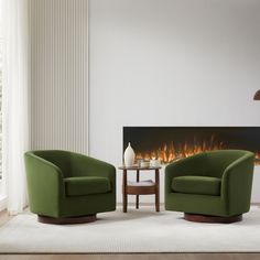 a living room with two green chairs and a fire place