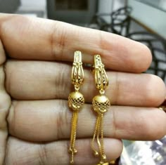 No photo description available. Fancy Gold Jewellery, Latest Gold Earrings, Hoop Nose Rings, Earrings For Daily Wear, Unusual Wedding Rings, Gold Earrings Indian, Gold Jhumka, Hair Chain, Gold Jhumka Earrings