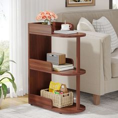 a living room with a couch, table and coffee cup on it's stand