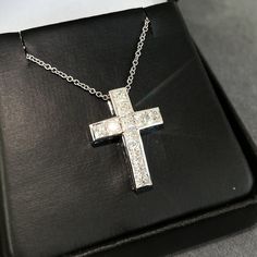 Beautiful princess cut cross necklace is absolutely stunning in person. Perfect for yourself or an amazing gift to be enjoyed for many years. Chain can be worn as 16, 17, or 18 inch and comes with a sturdy lobster clasp. Pendant is a 23mm X 16mm size Moissanite offers timeless beauty and exceptional value. This is the best compromise between cheap fakes (CZ, crystal, rhinestone) and extremely expensive and environmentally costly diamonds.  -1.65 Carat Best of Breed VVS1 Clarity D color GRA certified Moissanite Stones -More Fire and Brilliance than Cheap Priced Moissanite online -9.25 Hardness Rating (will never dull). Diamonds are rated 10, fake simulants only 3-4.  -Hand crafted out of solid 14K gold or sterling silver for the best balance of beauty and durability. Choose yellow or white Brilliant Cut Cubic Zirconia Cross Necklace As Gift, Cubic Zirconia Cross Necklace For Gift, Brilliant Cut Cross Necklace As Gift, Brilliant Cut Crucifix Necklaces As Gift, Brilliant Cut Crucifix Necklaces For Gifts, Brilliant Cut Crucifix Necklace For Gift, Cross Accessories, Princess Cut Moissanite, Solitaire Studs