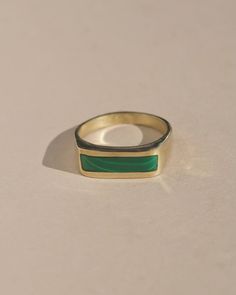 Saunter ~ to walk in a slow, relaxed manner, without hurry or effort; a leisurely stroll. Doesn't that sound nice? A gentle reminder to enjoy the simple beauty in the world, like the gorgeous delicate slice of stone set in a minimal band. A staple for everyday wear, this classic signet inspired ring shows up to make a Classic Green Jewelry With Smooth Bezel, Classic Everyday Green Rings, Classic Green Rings For Everyday, Classic Green Rings For Everyday Wear, Minimalist Adjustable Rings With Smooth Bezel, Classic Green Everyday Jewelry, Everyday Timeless Jewelry With Smooth Bezel, Timeless Everyday Jewelry With Smooth Bezel, Timeless Everyday Signet Ring With Smooth Bezel