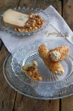 some food is sitting on a glass plate