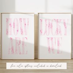 two pink and white art prints with the words how lucky are we? on them