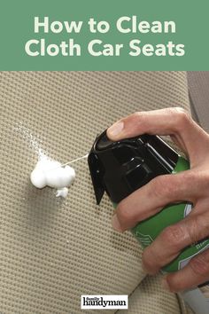 a person using a cloth cleaner to clean the seat cushions on a couch with text overlay that reads how to clean cloth car seats