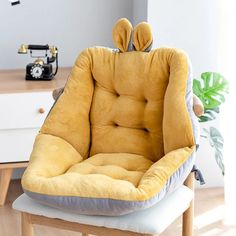 a chair that is shaped like a frog