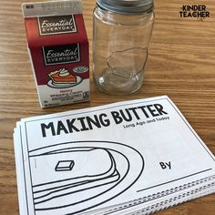 the ingredients for making butter sitting on a table next to a glass jar and napkins