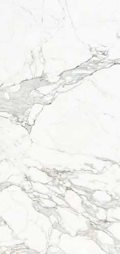 a white marble textured surface with black and grey lines on the top right corner