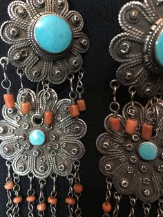 "Earrings ~ Afghanistan, Antique pair of earrings, Silver, Coral and Turquoise. 1930s early to mid 20th century. Length: 6\" Width: 1 3/4\" Tribal Silver Such an Amazing Find. Yes ~ along with basic simplicity ~ It's all about you You deserve to know about my fabulous Treasure chest HeartbeatHandmade and Big Sur Jade Treasures both (Etsy sites) Tribal Jewelry, Statement Piece Jewelry, Art to Wear Jewelry, Fantastic Fine Leather Beaded Handbags, an array of treasures for the traveler and mystic w Traditional Turquoise Jewelry With Filigree, Traditional Turquoise Filigree Jewelry, Vintage Turquoise Jewelry With Intricate Design, Vintage Turquoise Round Earrings, Vintage Round Earrings With Intricate Design, Bohemian Collectible Earrings, Vintage Chandelier Earrings With Intricate Design, Collectible Bohemian Earrings, Statement Piece Jewelry