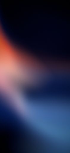 blurry image of an orange and blue background