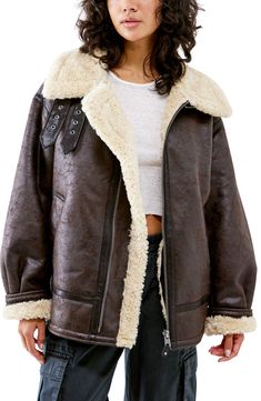 Modeled after vintage aviator styles, this crackled faux-leather jacket is lined with plush faux shearling to keep you cozy in cool weather. 26" length (size Medium) Spread collar 51% viscose, 49% polyester with polyurethane coating; 100% polyester faux shearling Dry clean Imported Shearling Aviator Jacket, Aviator Leather Jacket, Timeless Fashion Pieces, Jacket Outfit Women, Urban Outfitters Jacket, Aviator Jacket, Fur Leather Jacket, Bdg Urban Outfitters, Aviator Jackets