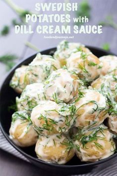 swedish potatoes with dill cream sauce in a black bowl