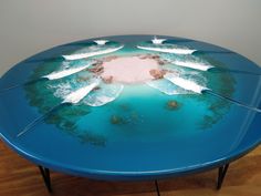 FantaSea Island.  Resin 3D artwork over MDF board.  This artwork can be hung on a wall or set up as a display / coffee table. Fit a glass top and sip coffee while you and your friends dream of surfing FantaSea island. Brakets provided , recommend 8mm toughened glass. Table legs available at Bunnings for $15 ea. Extra charge for postage for legs contact seller Artwork uses real sand and rocks. Multiple layers of resin were used and over 12 stages of severals weeks. Certificate of Authenticity pro Art Wave, Display Coffee Table, Art Ocean, Wave Art, Mdf Board, 3d Artwork, Surf Art, Art 3d, Ocean Art