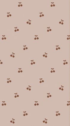 a wallpaper with cherries on it in brown and beige colors, the background is made up of small cherries