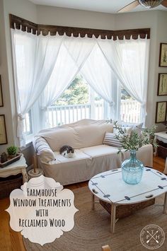 a living room filled with furniture and windows