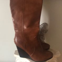 Beautiful, Comfortable Leather Wedge Boots Leather/Brown With Coach Metal Insignia Very Good Condition Very Comfortable Ridged Bottom Sole Can Be Easily Pulled Up With A Generous Size Zipper Originally Priced At $400.00 From Coach Of New York Knee High Wedge Boots, Boots Leather, Leather Wedges, Coach Shoes, Wedge Boots, Shoes Heels Boots, Wedge Boot, Shoes Women Heels, Calf Leather