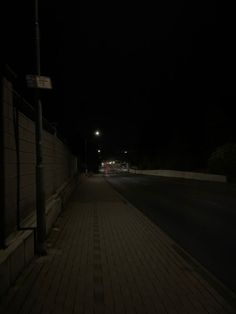 an empty street at night with no one on it