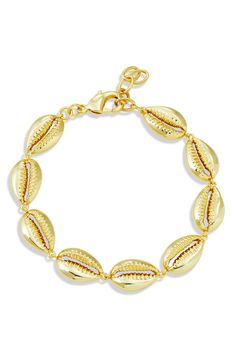 Show off beachy style with this cowrie-shell bracelet plated in gleaming 18-karat yellow gold for eye-catching shine. 1/2" width Lobster clasp closure 18k-gold plate Imported Italian Summer Jewelry, Beachy Products, Beachy Jewlery, Beachy Anklets, Cowrie Shell Bracelet, Beachy Bracelets, Coastal Jewelry, Beachy Jewelry, Preppy Jewelry