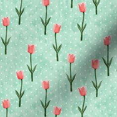 pink tulips on mint green polka dot fabric with white dots in the background