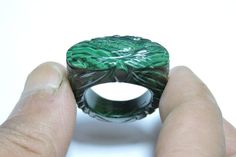 Buyer Will Receive 1 Piece Natural Malachite Full Carved Single Gemstone Made Ring.you will really love it.you will gift it to your love ones and friends. Product Details Product Name - Natural Malachite Full Carved Single Gemstone Made Ring. Gemstone - Natural Malachite Quantity - 1 Piece 100% Natural ----------------------------------------------------------------------------- THIS BEAUTIFUL ITEM IS AVAILABLE ONLY ON ETSY ------------------------------------------------------------------------ Malachite Rings Gift, Malachite Rings As Gifts, Malachite Rings Suitable For Gifts, Green Intaglio Ring Jewelry, Carved Green Round Jewelry, Green Carved Round Jewelry, Green Carved Rings Perfect For Gifts, Green Carved Rings For Formal Occasions, Unique Carved Round Rings