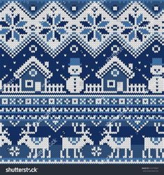 christmas knitted pattern with houses and snowflakes on the blue background stock photo