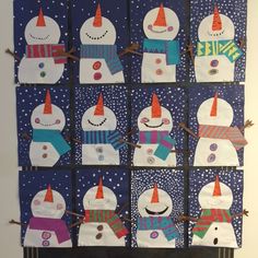 a bulletin board with snowmen on it