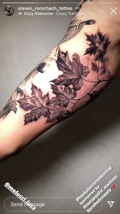 an arm tattoo with leaves on it