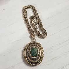 Vintage Prong Set Glass Jade Color Centerpiece Gold-Tone Locket On Rope Chain. Green Stone Is Glass With Beautiful Carved Design On Metal Gold-Tone Ornate Front & Back Frame. Holds Two Photos. (Comes With Original Black & White Vintage Photos When Purchased From Estate Sale) As Seen. Spring Ring Clasp Closure Locket Closes/Snaps Very Well Unsigned Approx Measurement: 18" Chain 2" X 1.5" Locket Disclaimer: Due To The Unique Nature Of Vintage Items, Imperfections & Flaws Are Normal, Consistent To Vintage Necklace Antiques, Antique Gold Necklace, Intricate Rings, Necklace Stack, Black White Vintage, Jade Color, Glass Locket, Key Jewelry, Unique Nature